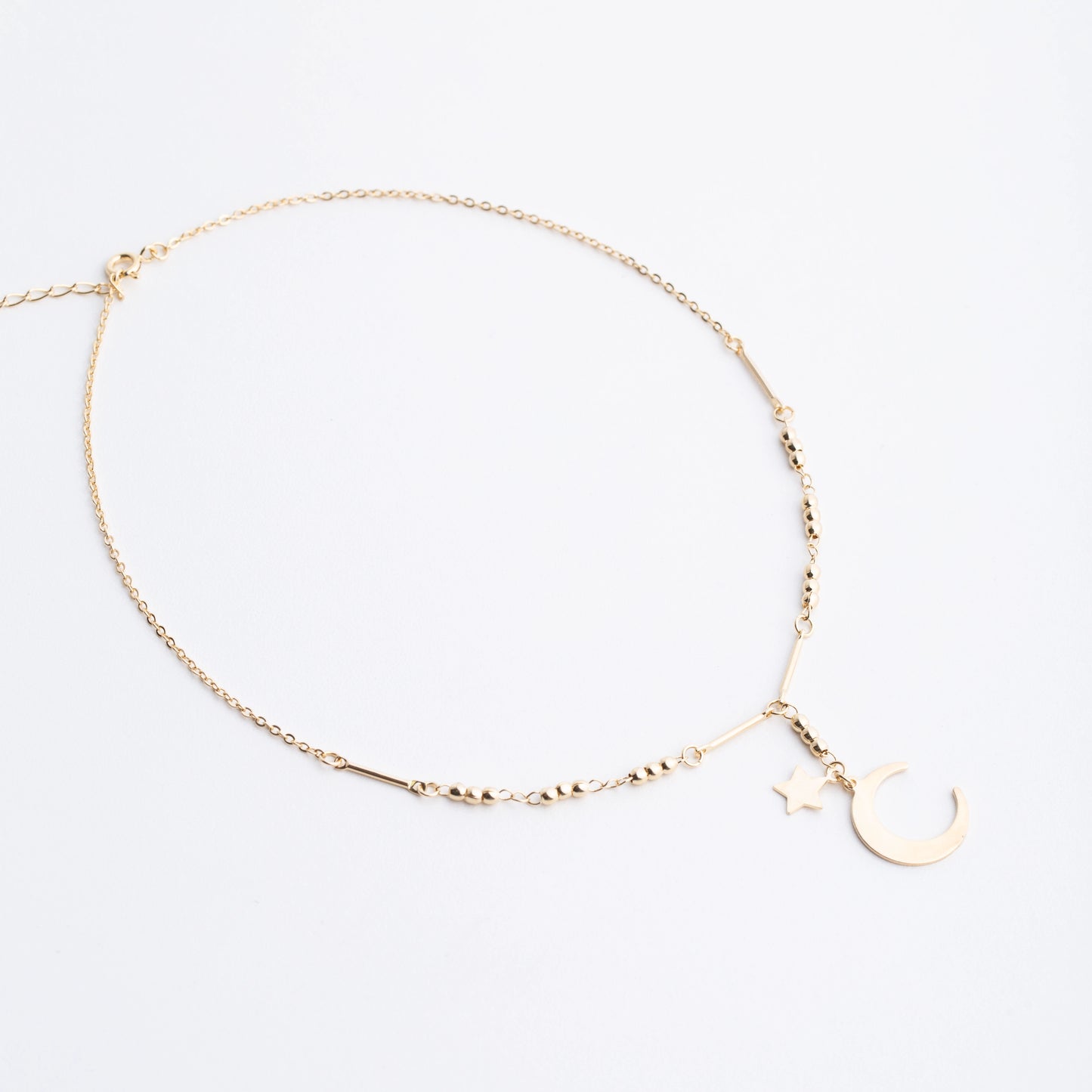 Chain with Gold Moon and Star Pendant